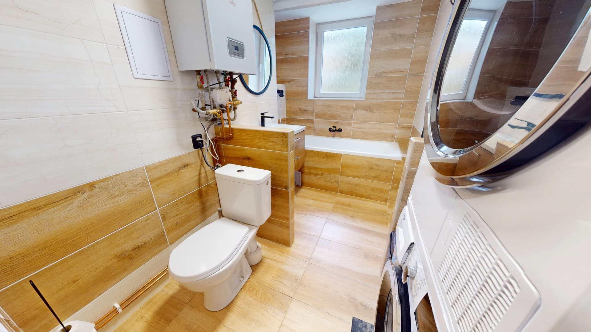 Koupelna — vana a WC
